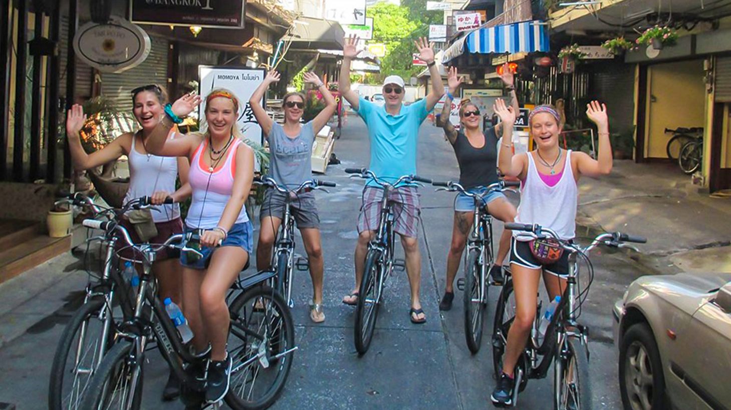 Explore the Bustling City & Backstreets on an Afternoon Biking Tour with Snacks & Drinks 2