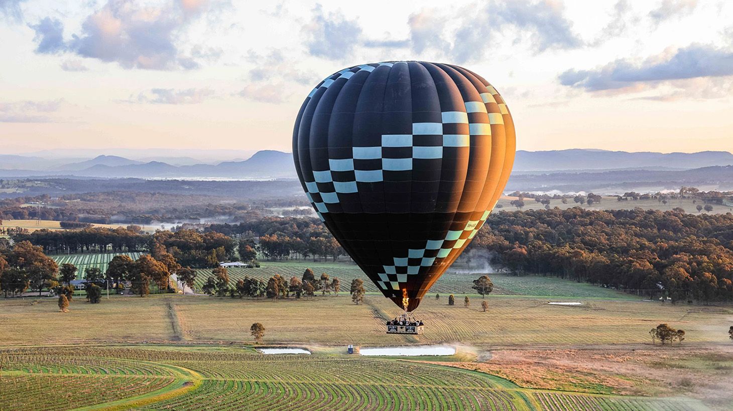Mid-Week Early Morning Hot Air Balloon Flight with Gourmet Champagne Breakfast & Digital Photo Package
