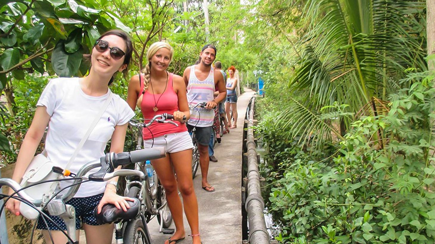 Explore the Bustling City & Backstreets on an Afternoon Biking Tour with Snacks & Drinks 1