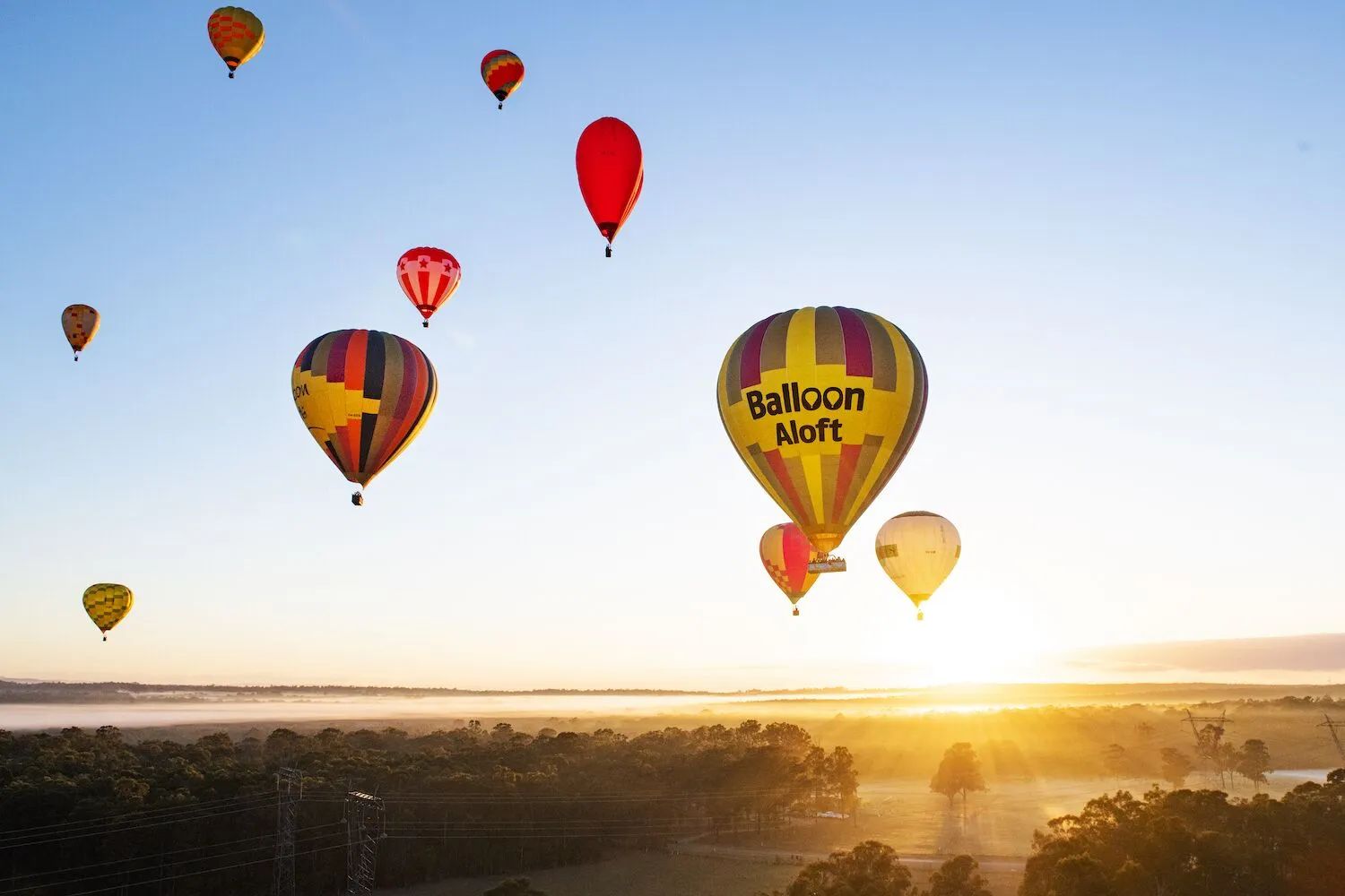 Breathtaking Sunrise Hot Air Balloon Flight with Gourmet Breakfast & Sparkling Wine Tasting