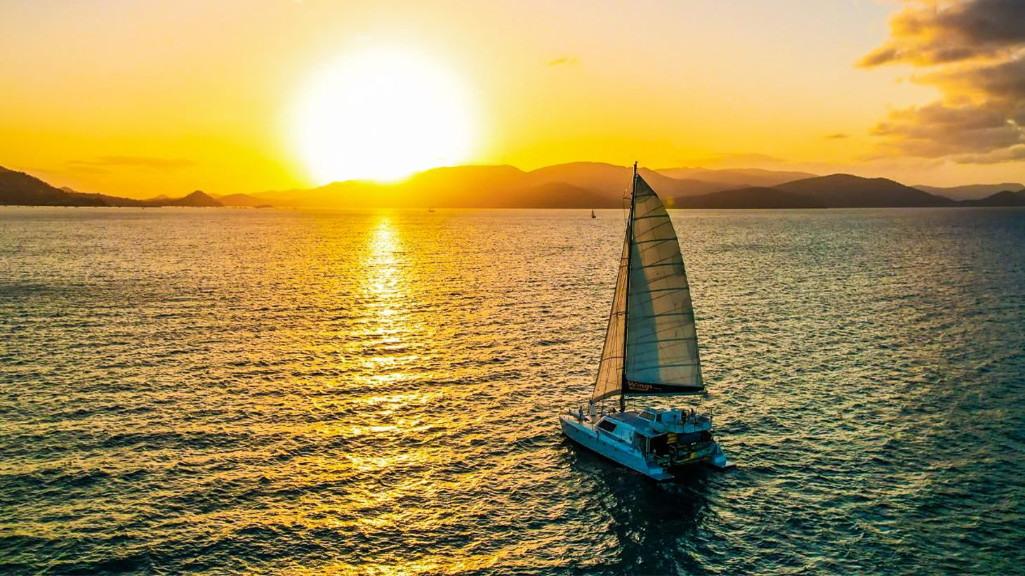 Two-Hour Airlie Beach Sunset Cruise with BYO Drinks, Grazing Platter & Tropical Welcome Drink