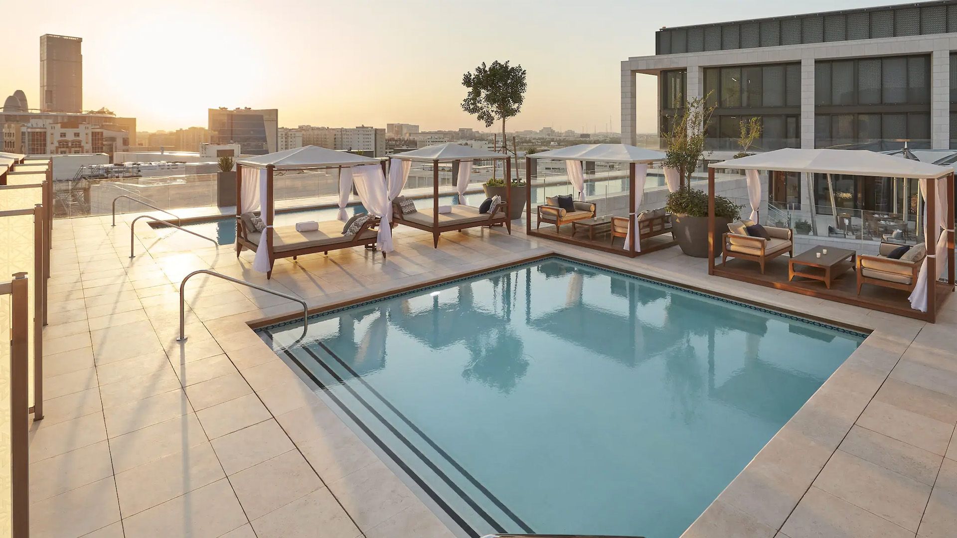 Five-Star Downtown Doha Urban Escape with Two Rooftop Swimming Pools