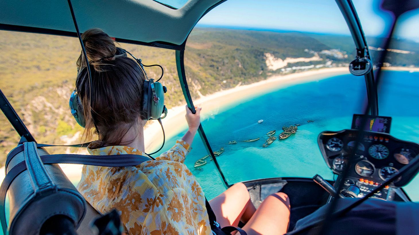 Official Tangalooma™ Day Cruise (Extended): with Scenic Helicopter Tour, ATV Quad Biking, Lunch, Cocktail & Dolphin Viewing