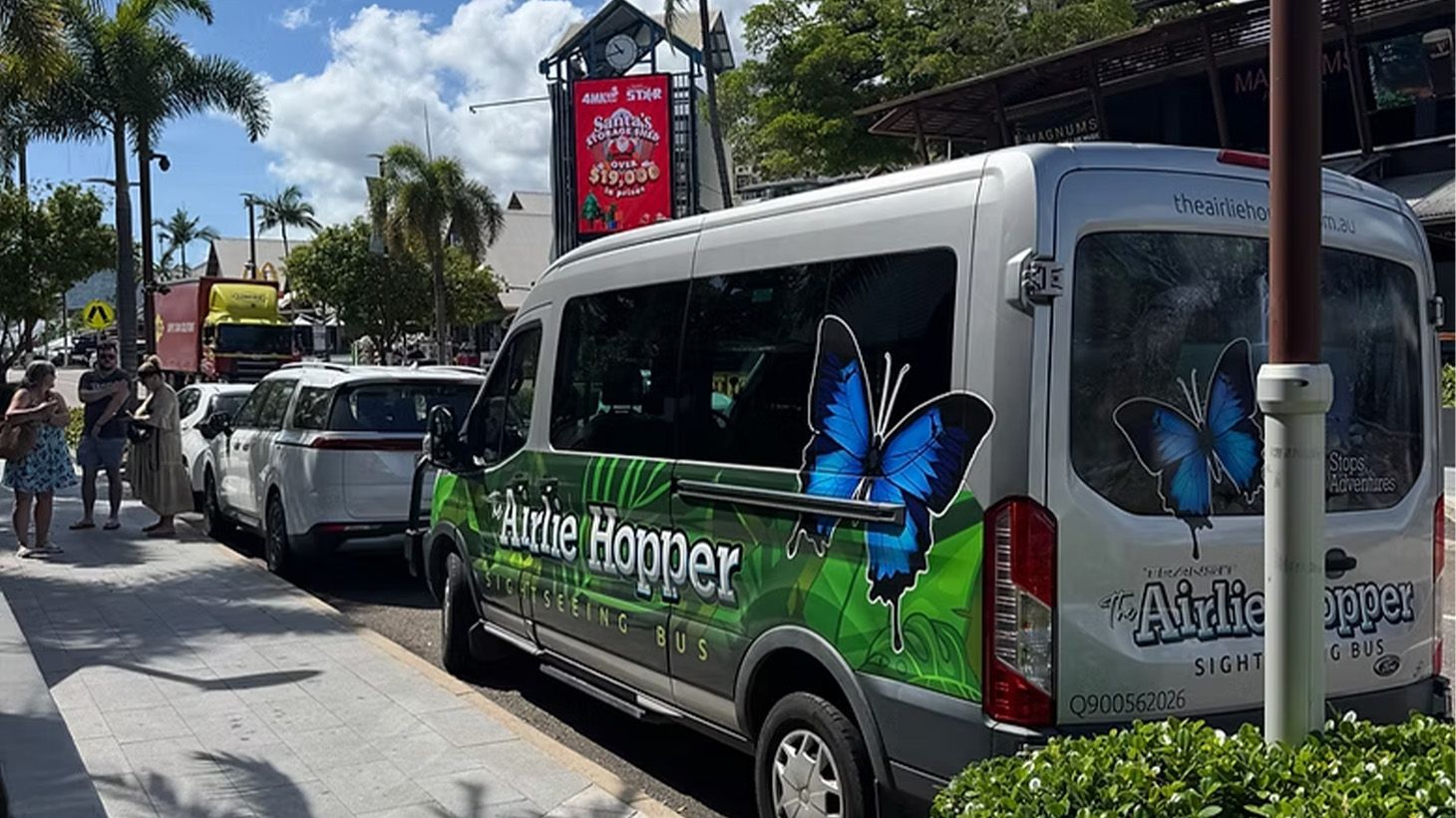 Full-Day Airlie Beach Sightseeing Bus Tour with Coffee Plantation & Rainforest Swim