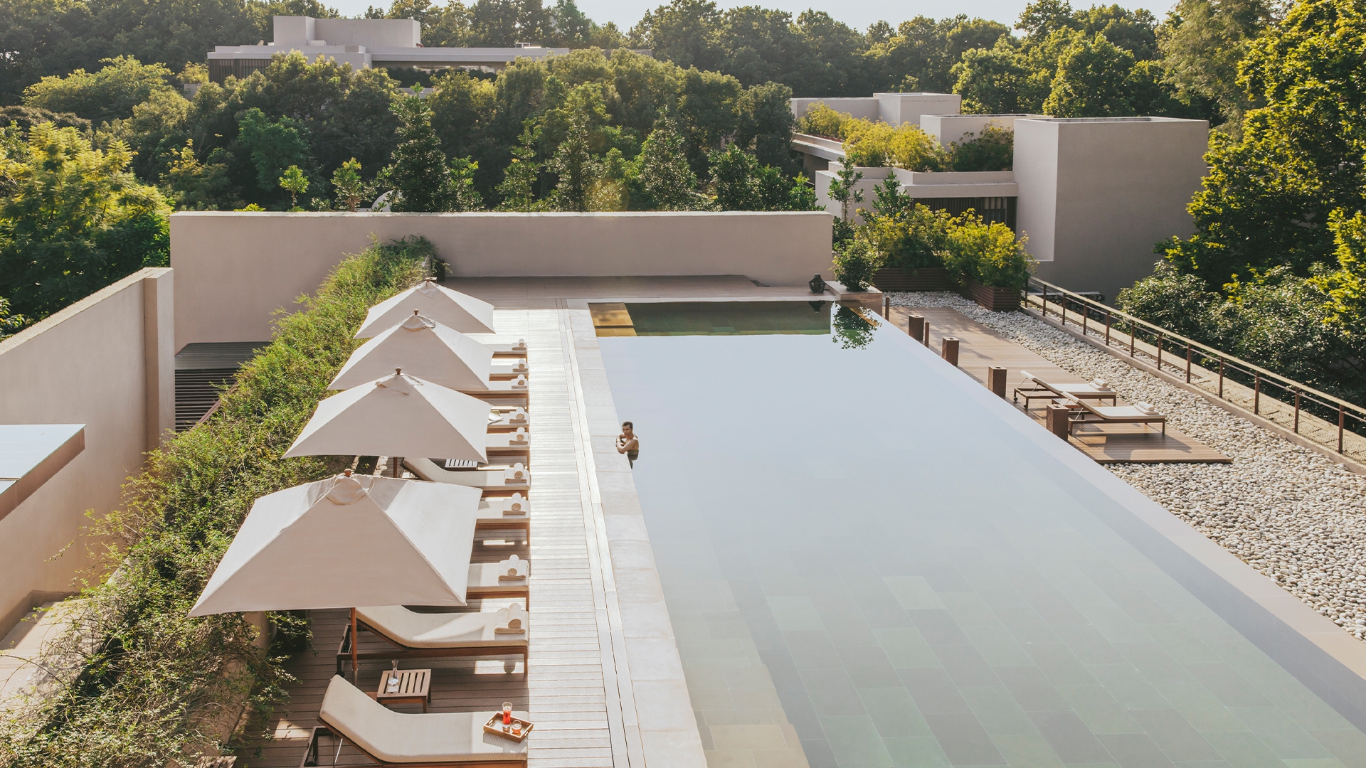 Poolside view at Six Senses wellness retreat near Himalayan foothills.