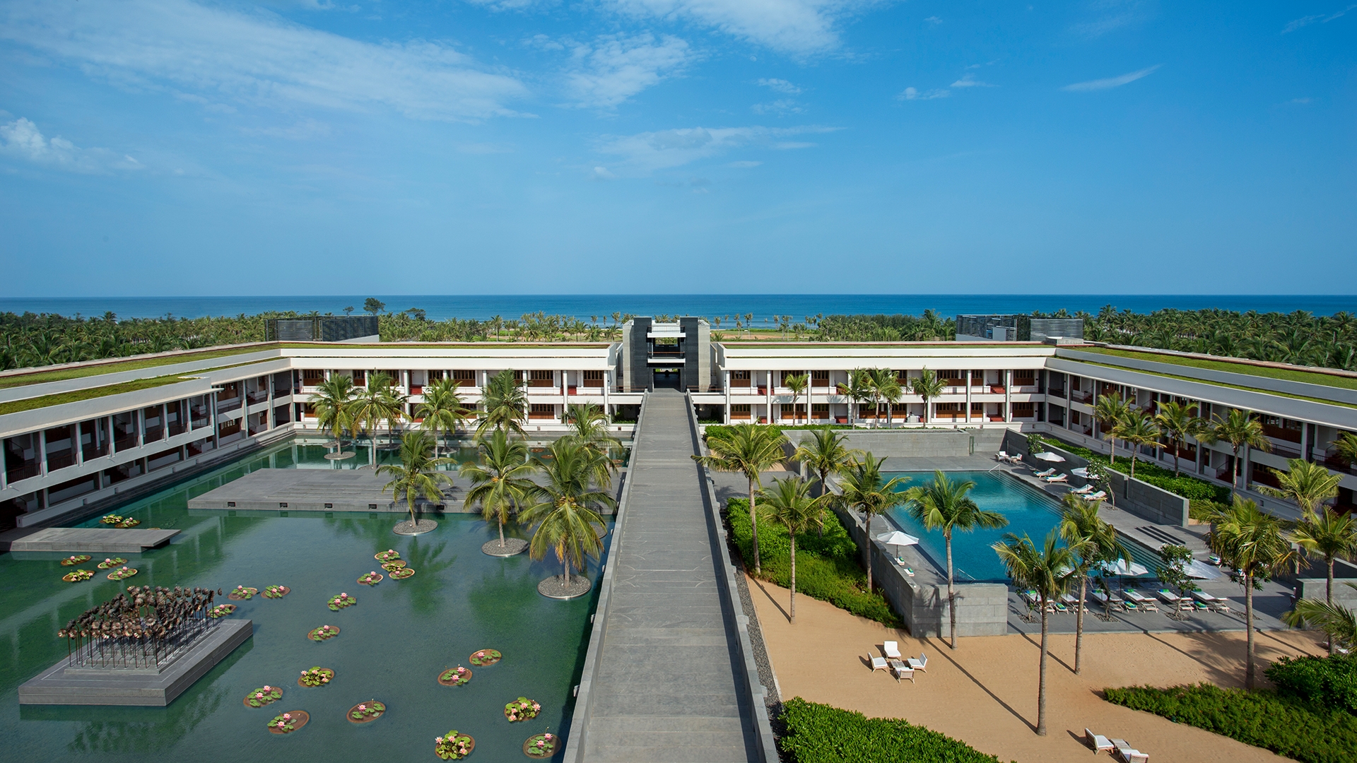 Five-star beachfront resort with a pool, overlooking Bay of Bengal.