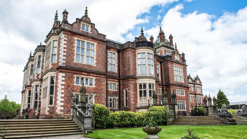 17th-century Jacobean mansion in Cheshire with ornate architecture.