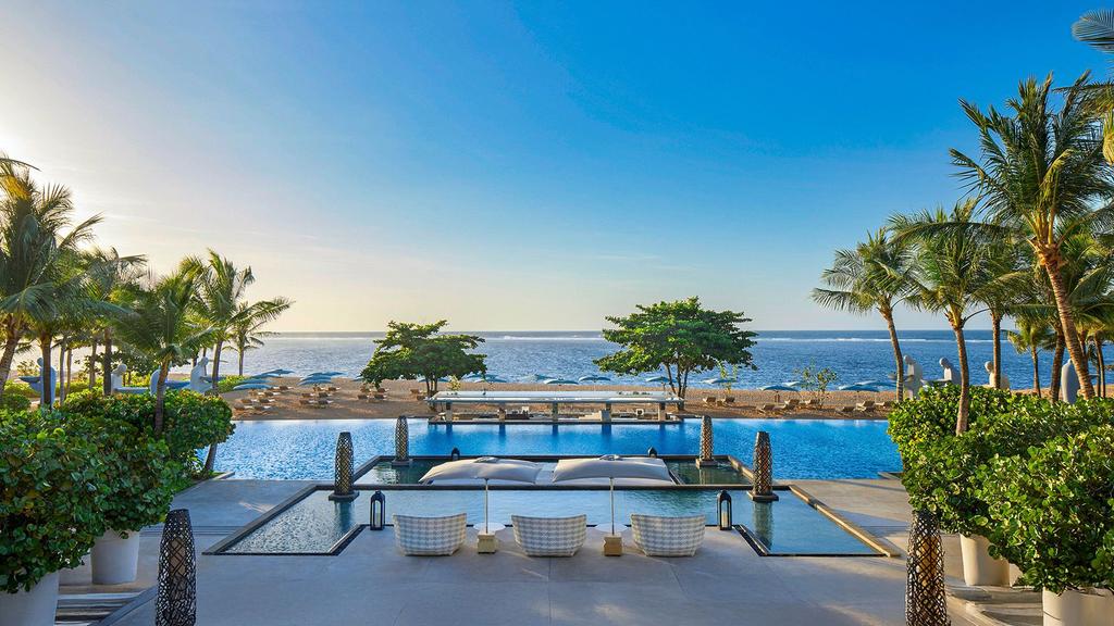 Luxurious Mulia Resort in Nusa Dua with expansive pools and tropical gardens. 