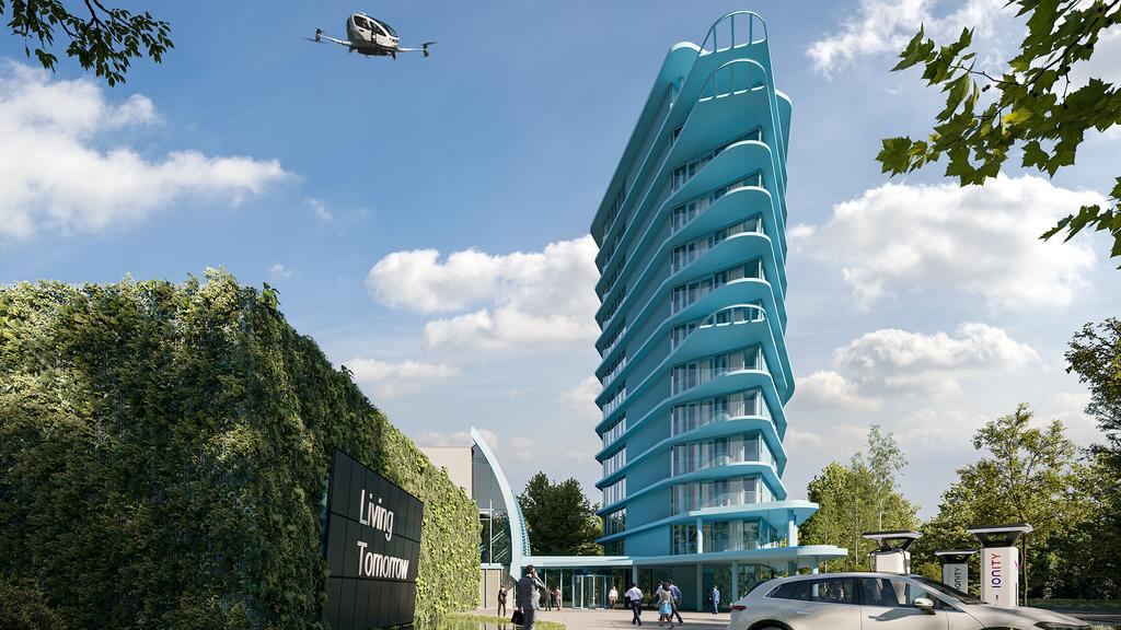 Futuristic hotel in Brussels with modern architecture and greenery.