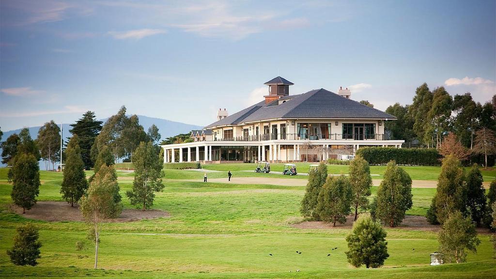 Yarra Valley Lodge overlooking championship golf course and lush greenery.