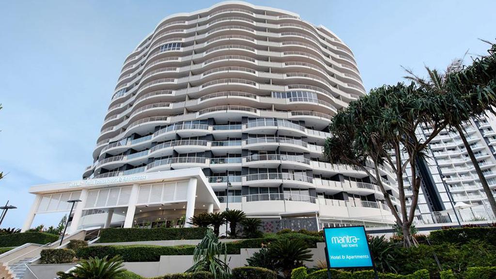 Stylish apartment building near Coolangatta Beach with modern amenities.
