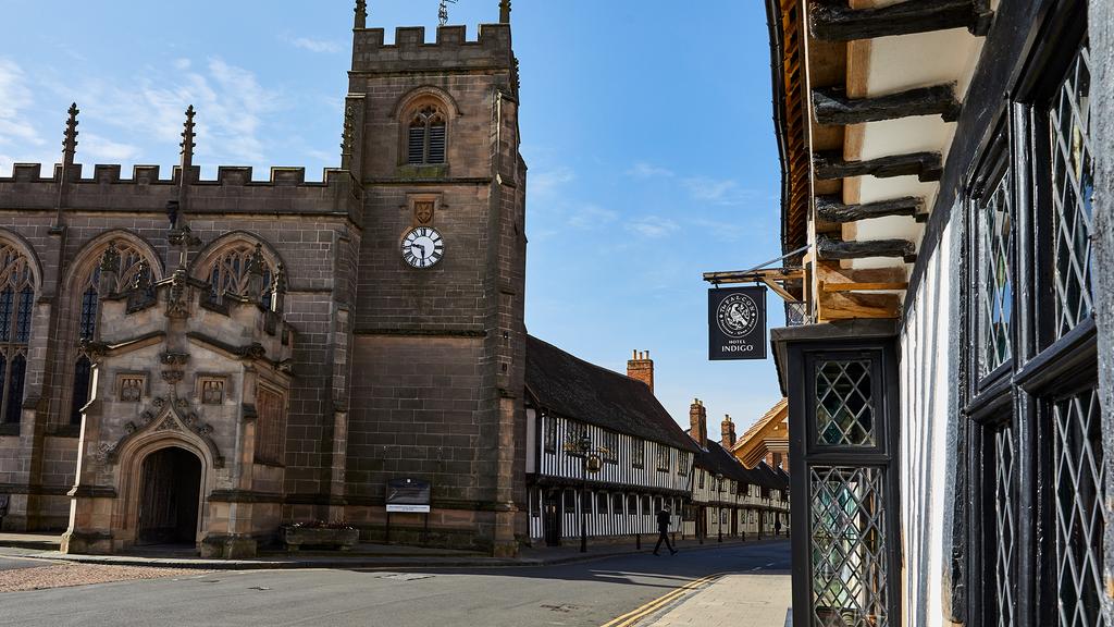 Charming street view of Hotel Indigo Stratford-upon-Avon near historical buildings.