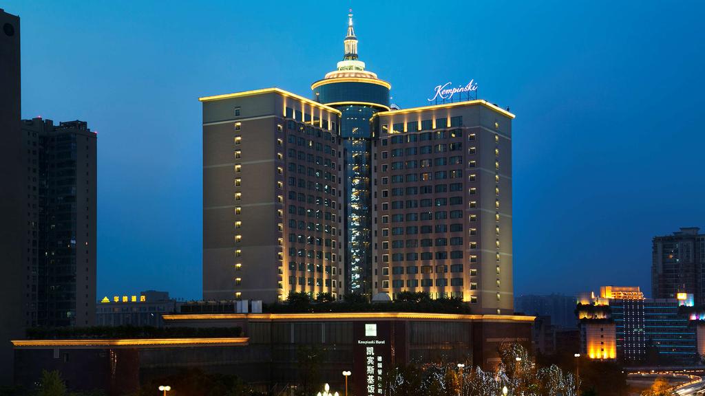 Kempinski Hotel Chengdu illuminated at night, showcasing modern luxury.