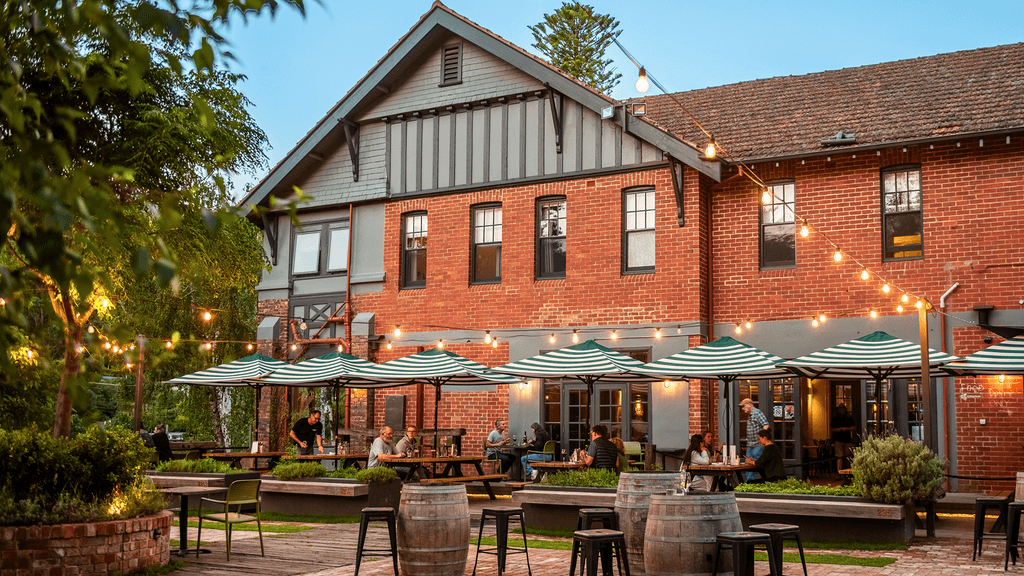 Restored heritage Yarra Valley hotel with courtyard dining and relaxed countryside atmosphere.