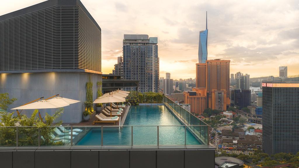 Rooftop pool at Kimpton Naluria Kuala Lumpur, an IHG Hotel