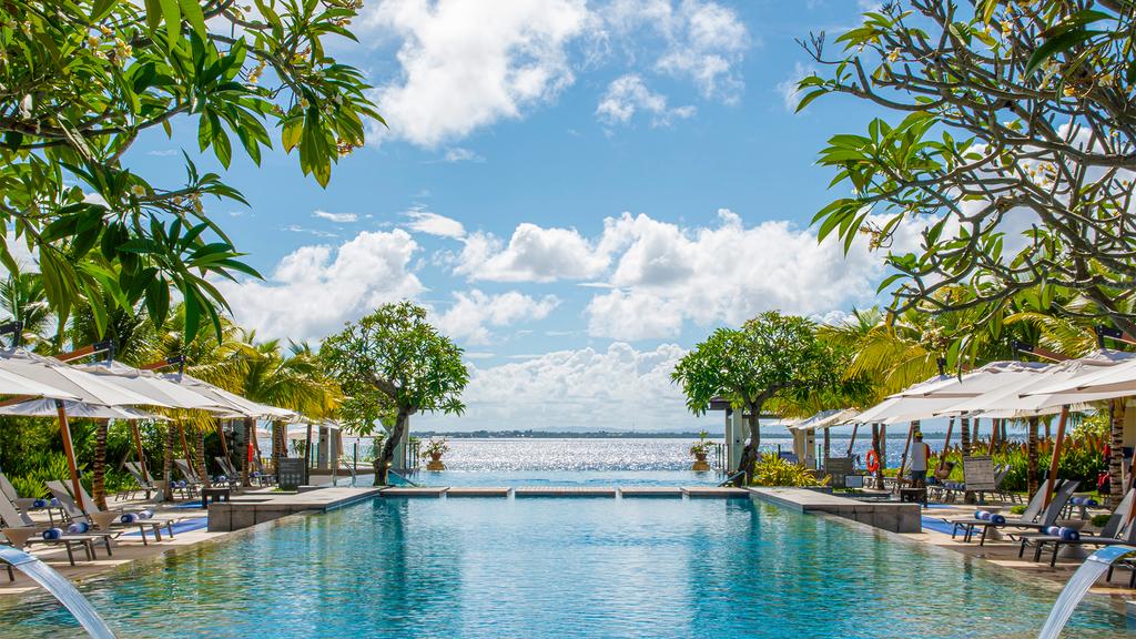 Infinity pool at Crimson Resort and Spa Mactan with ocean views.