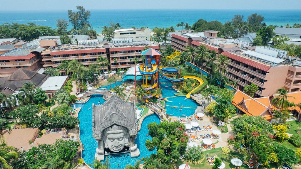 Phuket resort with pools and waterslide near Karon Beach.