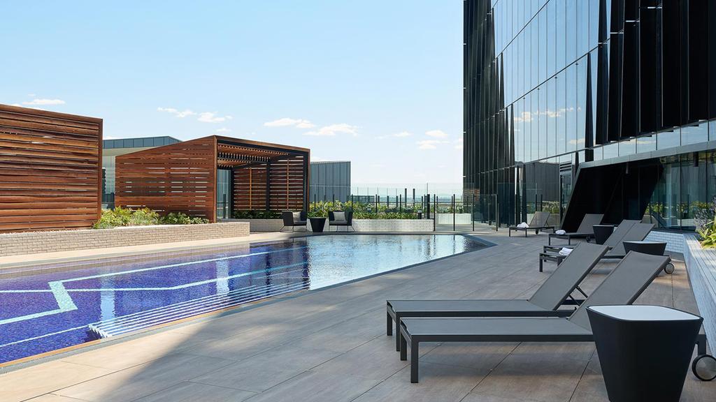 Rooftop pool at a modern hotel in Melbourne's Docklands district.