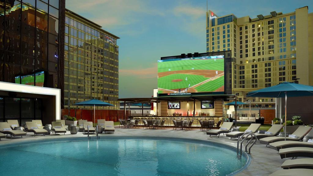 Rooftop pool and bar area in an uptown Charlotte hotel.