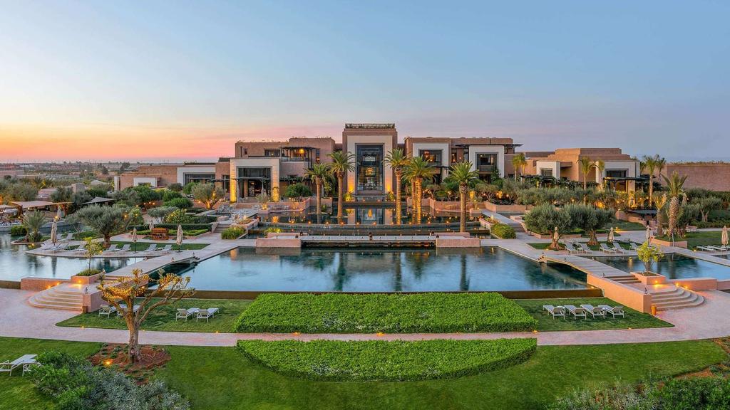 Luxurious resort with a vast pool and stunning architecture in Marrakech.
