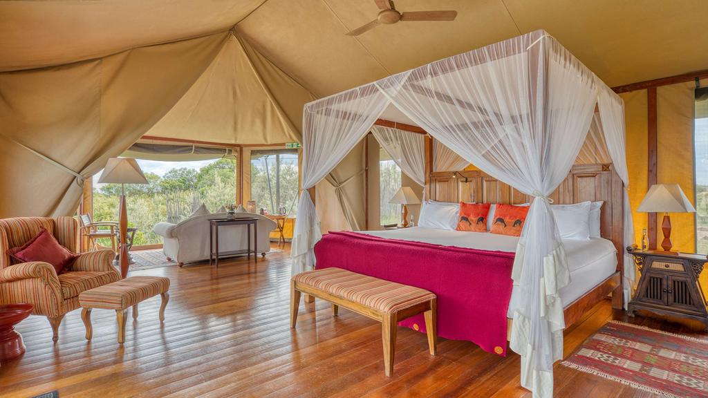 Luxury safari tent interior at Olare Mara Kempinski in Masai Mara.