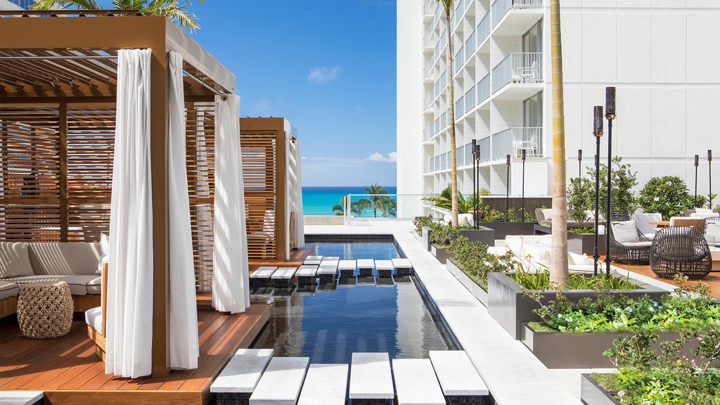 Infinity pool with cabanas overlooking Waikiki Beach at 'Alohilani Resort. 