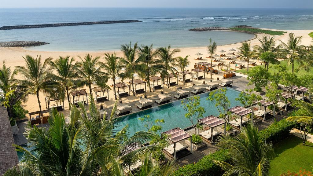 Luxurious Bali beachfront suites with pool and ocean views at The Apurva Kempinski Bali in Nusa Dua. 