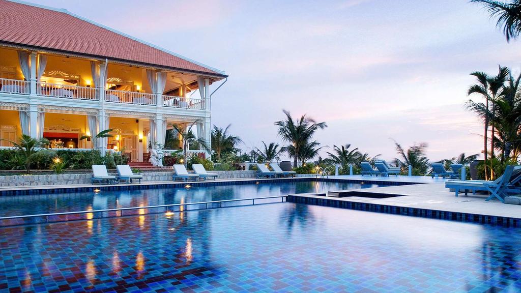 French colonial-style mansion with a pool in Phu Quoc, Vietnam.