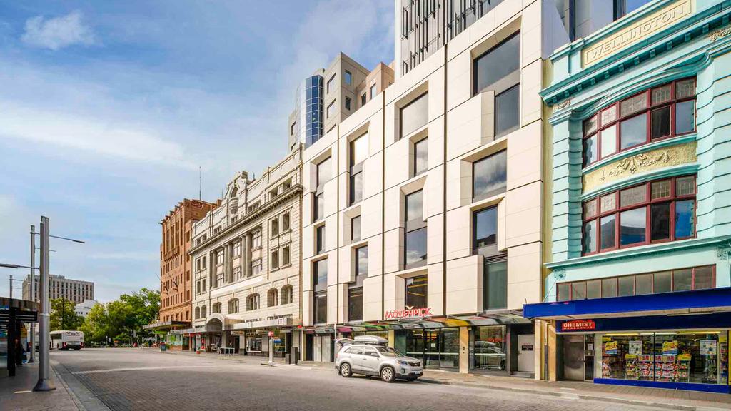 Modern hotel facade in Hobart's vibrant waterfront precinct.