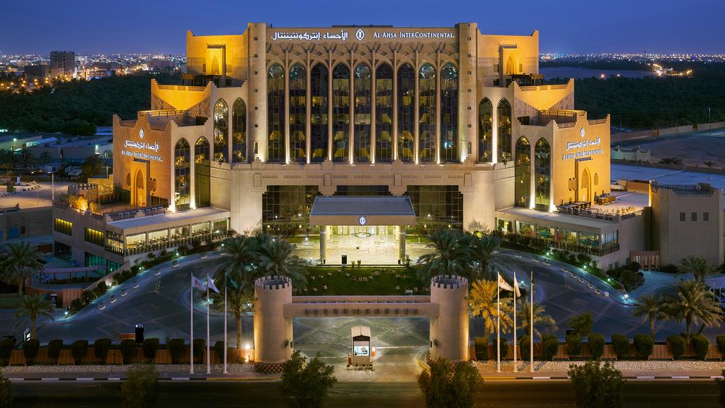 InterContinental Al Ahsa hotel lit at night in Saudi Arabia's largest oasis.