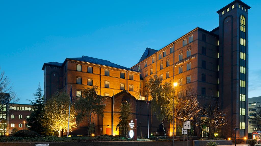 Exterior view of Crowne Plaza Leeds at dusk.