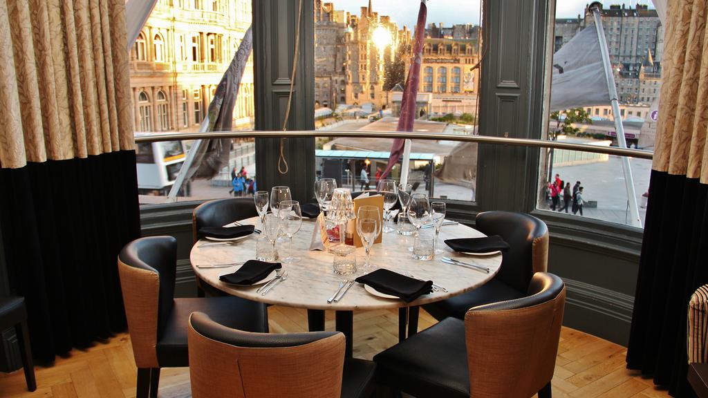 Elegant dining table with city view at Hotel Indigo Edinburgh.