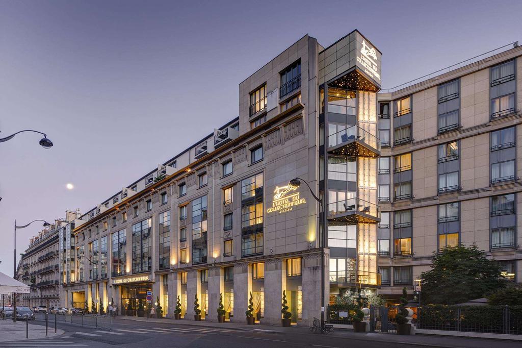 Elegant Art Deco hotel exterior near Arc de Triomphe in Paris.