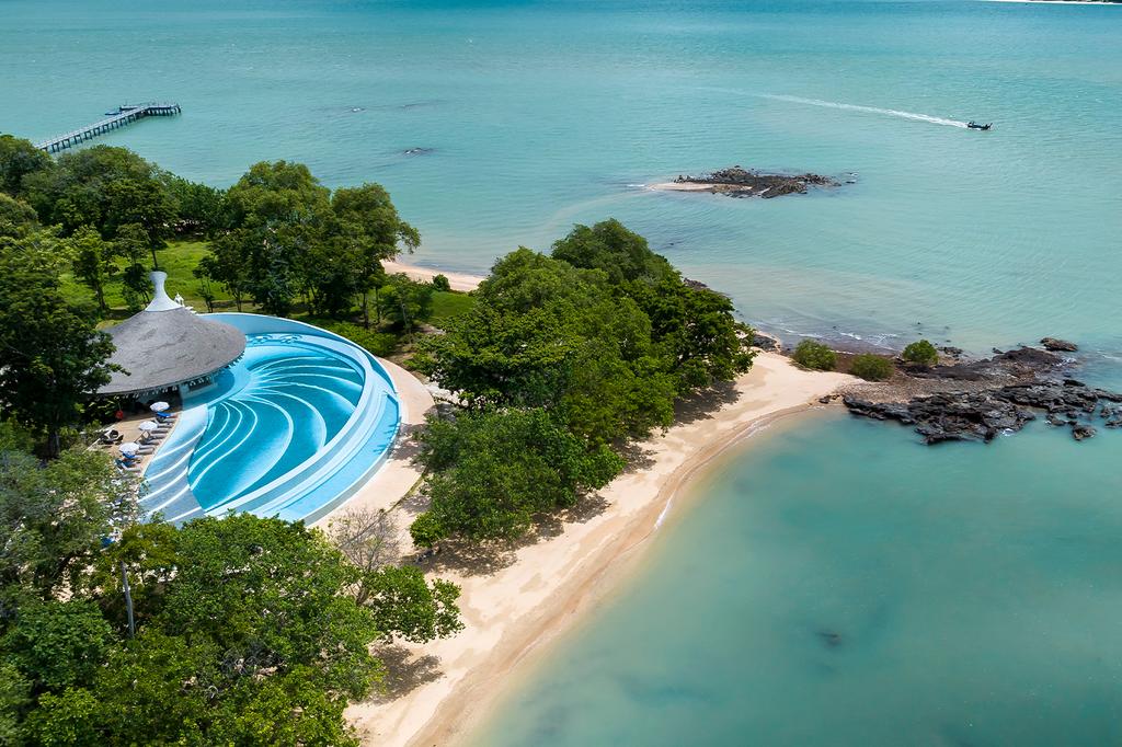 Aerial view of luxurious pool and beach at Island Escape Burasari.