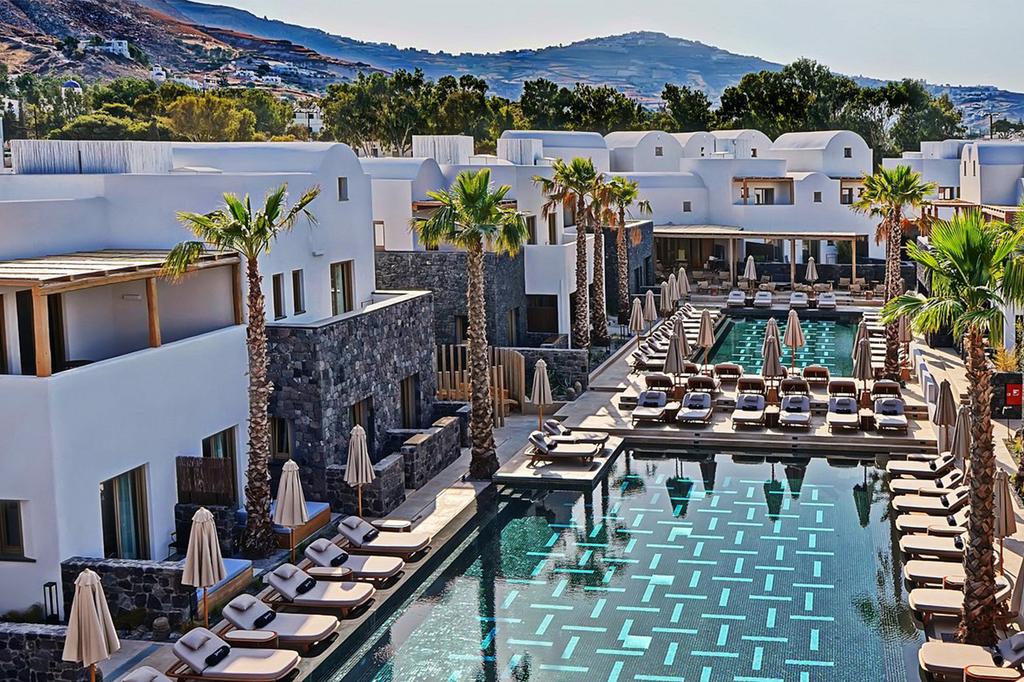 Luxurious poolside at Radisson Blu Zaffron Resort in Santorini.