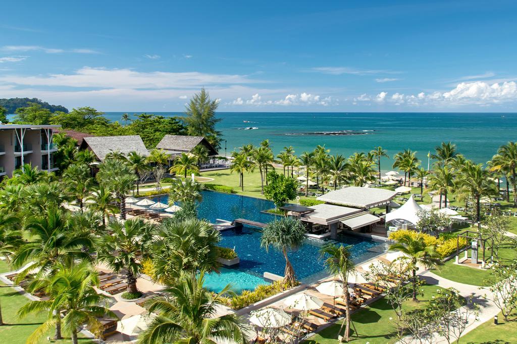 Aerial view of a The Sands Khao Lak by Katathani with pool and ocean in Khao Lak. 