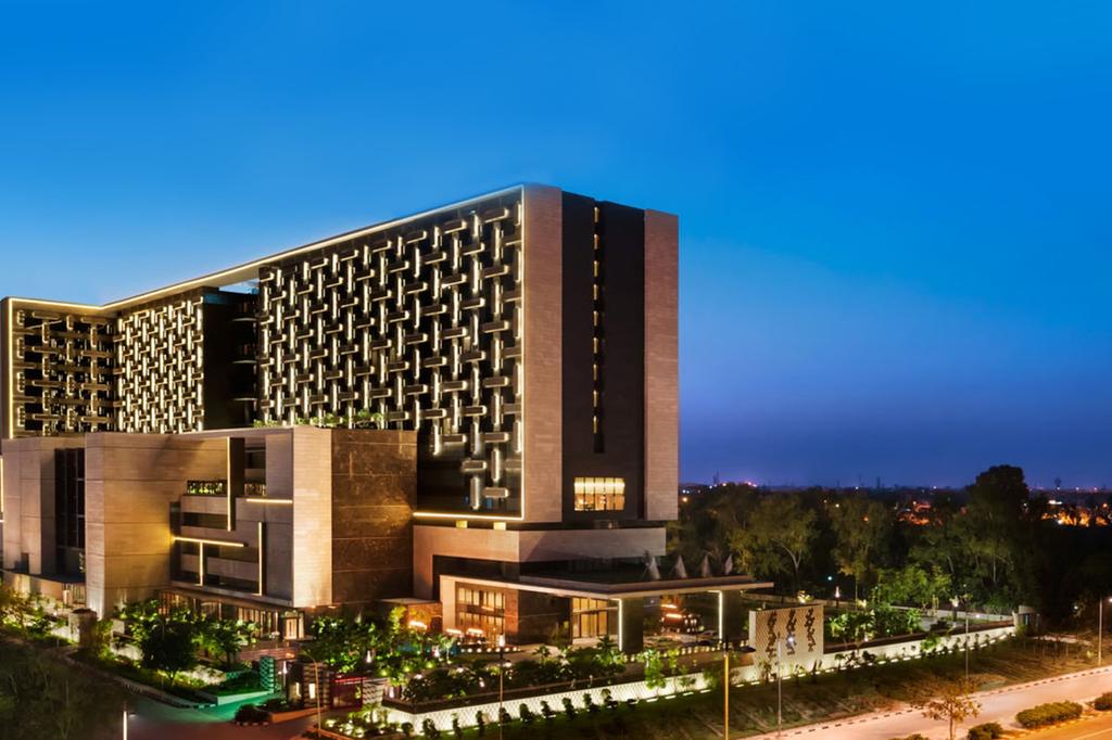 The Leela Ambience Convention Hotel in Delhi at twilight.