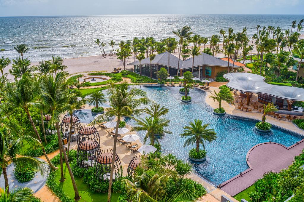 InterContinental Phu Quoc resort pool with ocean view and lush gardens.