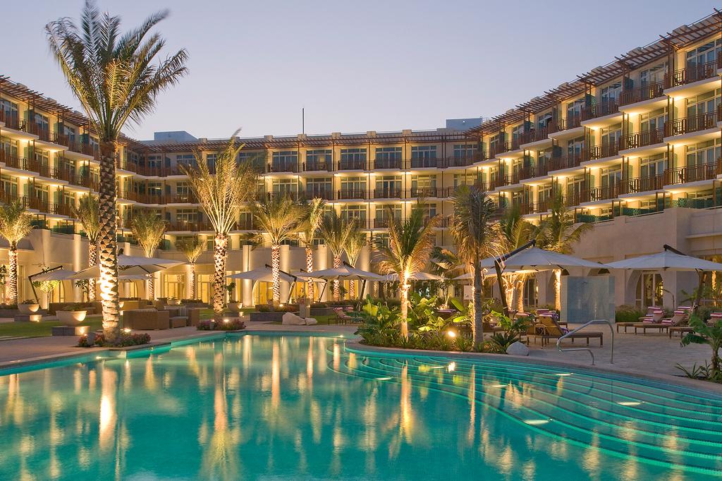 Elegant hotel pool area at Crowne Plaza Duqm by the Arabian Sea.