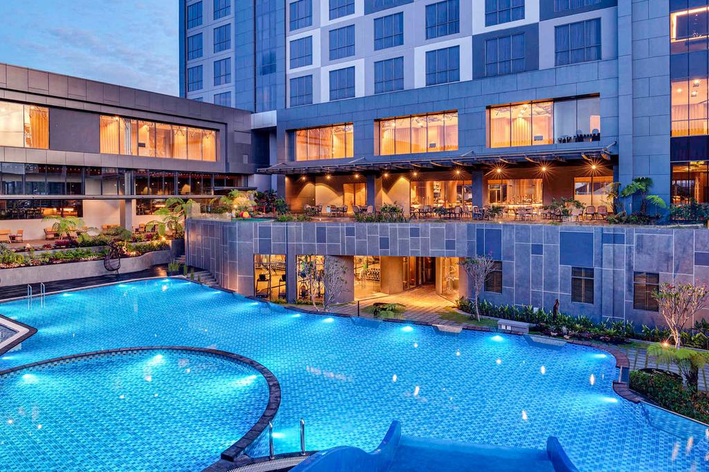 Luxurious hotel with pool and modern architecture in Malang, East Java.