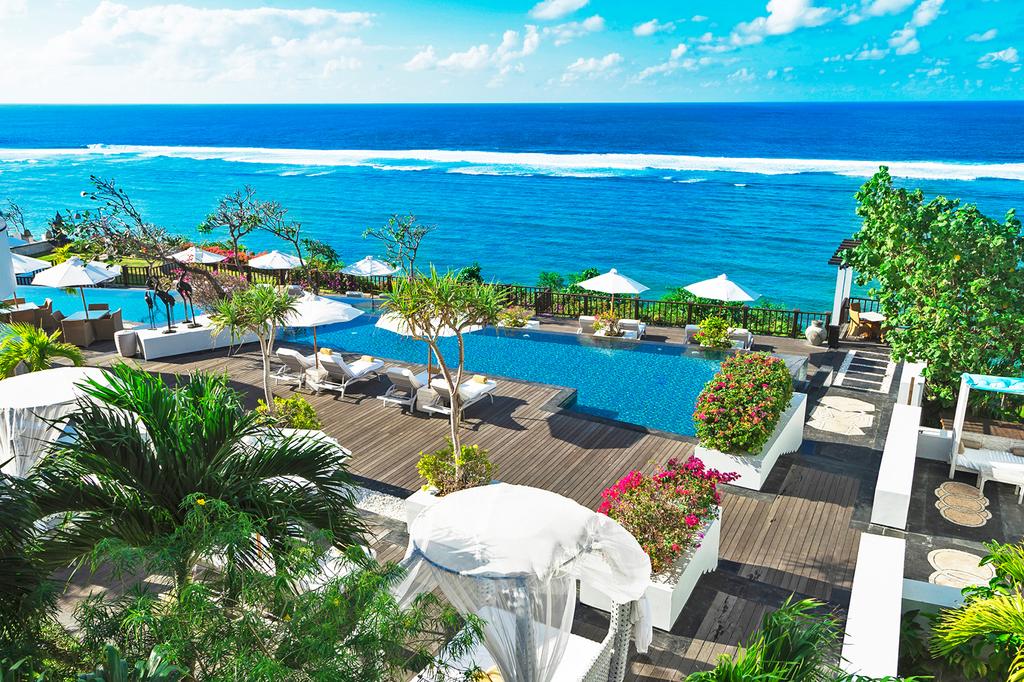 Luxurious clifftop resort pool overlooking the Indian Ocean in Nusa Dua.
