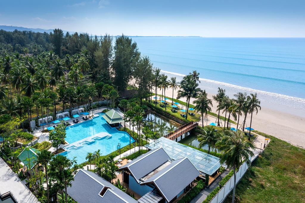 Aerial view of Grand Mercure Khao Lak Bangsak with pool and tropical gardens. 