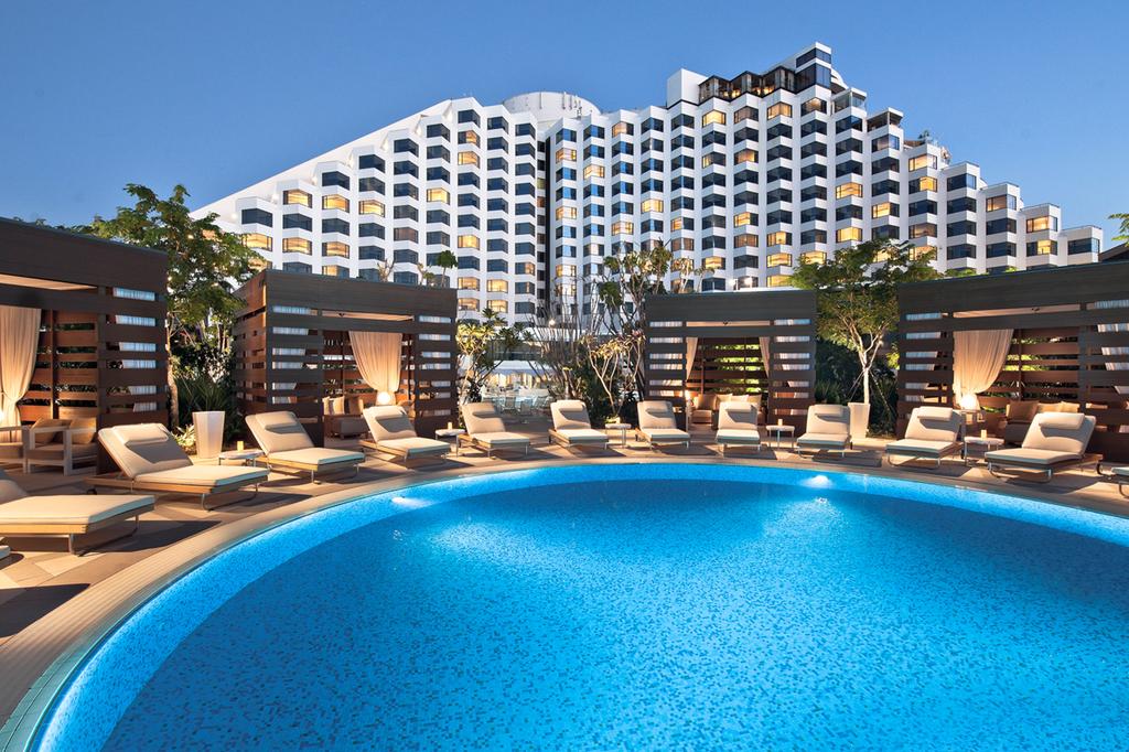 Luxury hotel pool area with cabanas at Crown Metropol Perth.