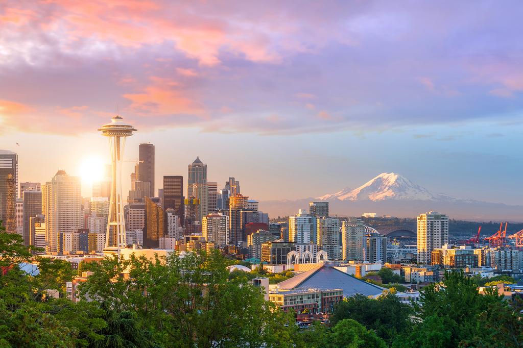 Seattle skyline with Space Needle at sunset.