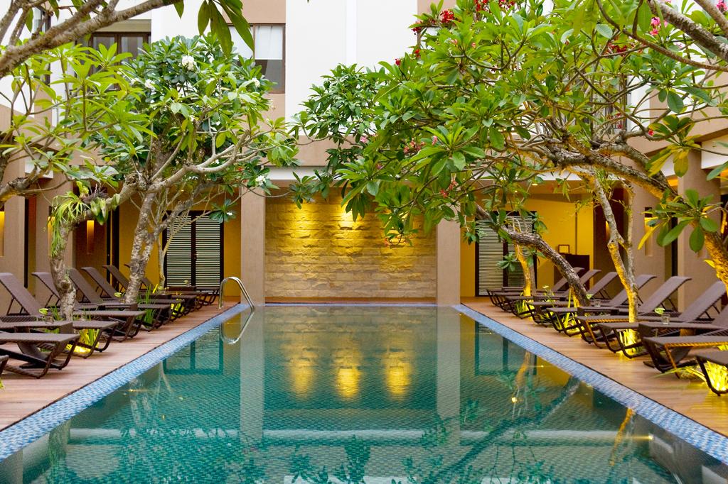 The outdoor pool at Hotel Santika Kuta Bali