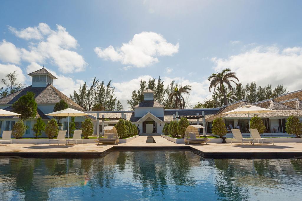 The Trident Hotel's villa with pool and lush surroundings in Jamaica.