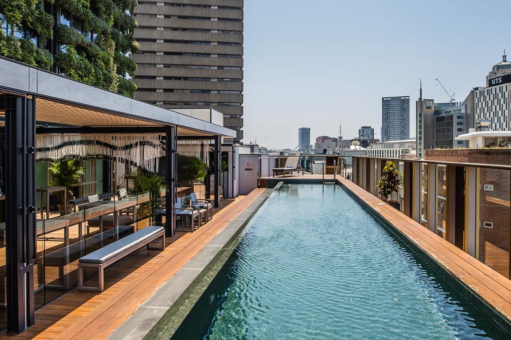 Rooftop pool with city views at a heritage hotel in Sydney.