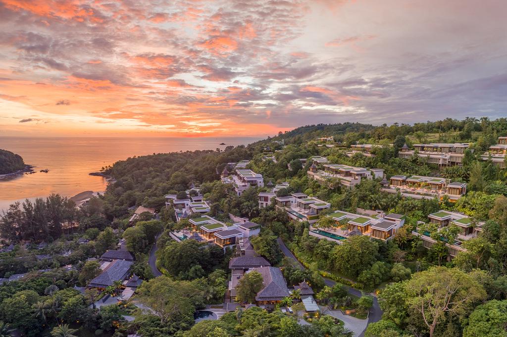Luxurious resort on Phuket island with sunset over Andaman Sea.
