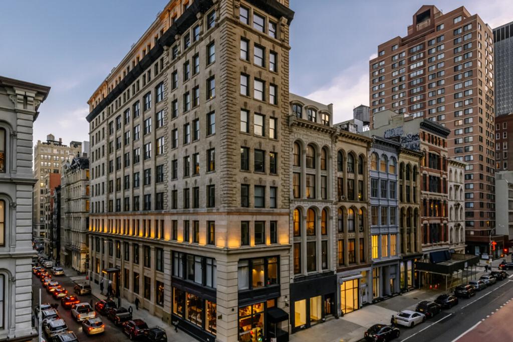 Chic Walker Hotel Tribeca exterior in New York City at dusk.
