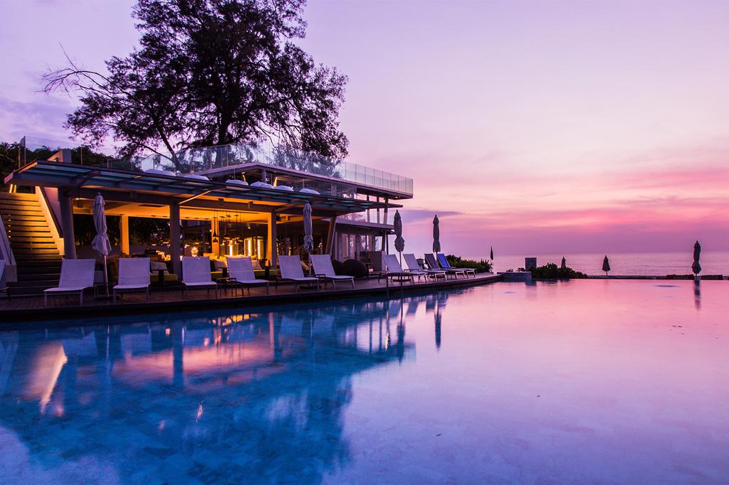 Infinity pool with sunset view at Veranda Resort & Villas Hua Hin.